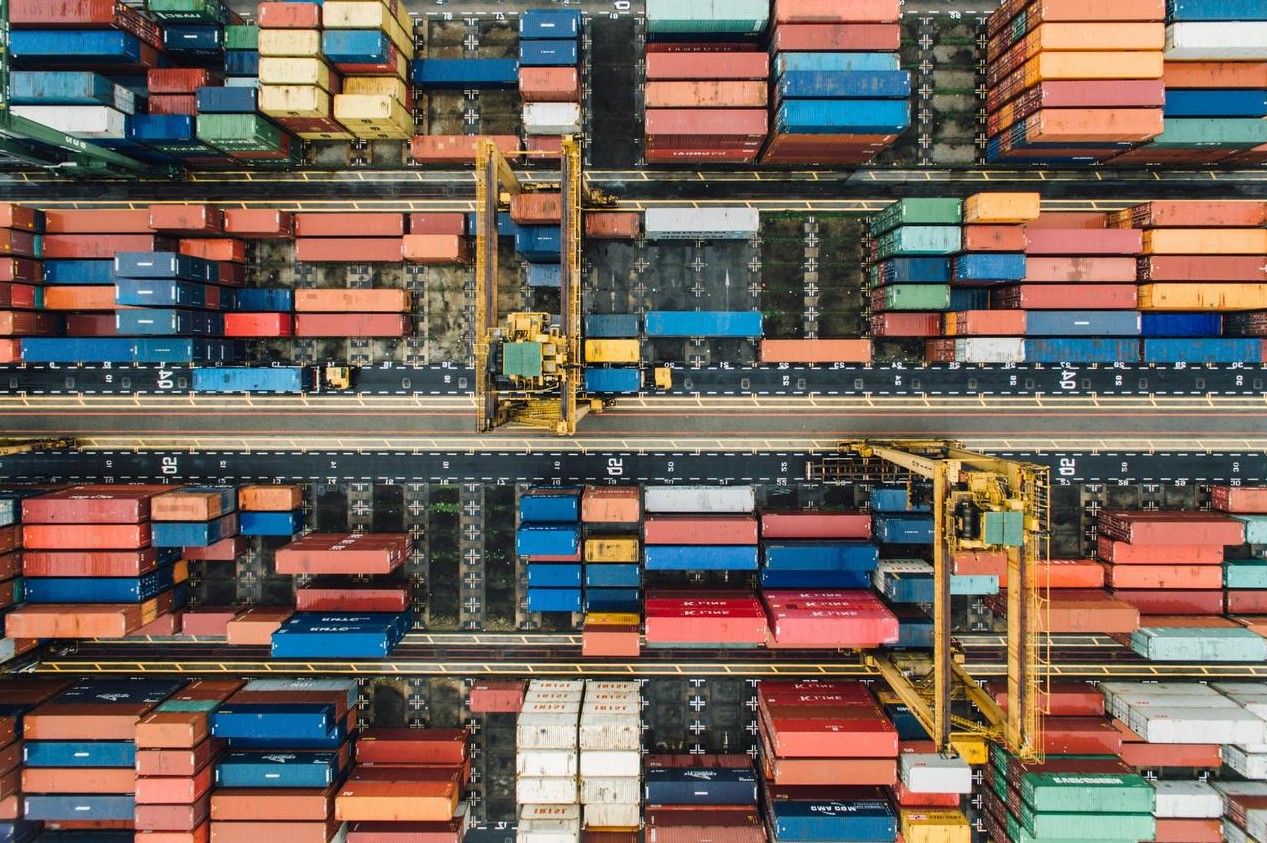 Parents with children at bus stop